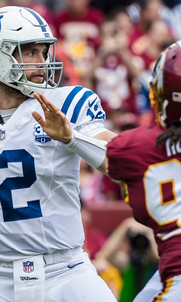 Luck's two touchdowns lead Colts to first victory
